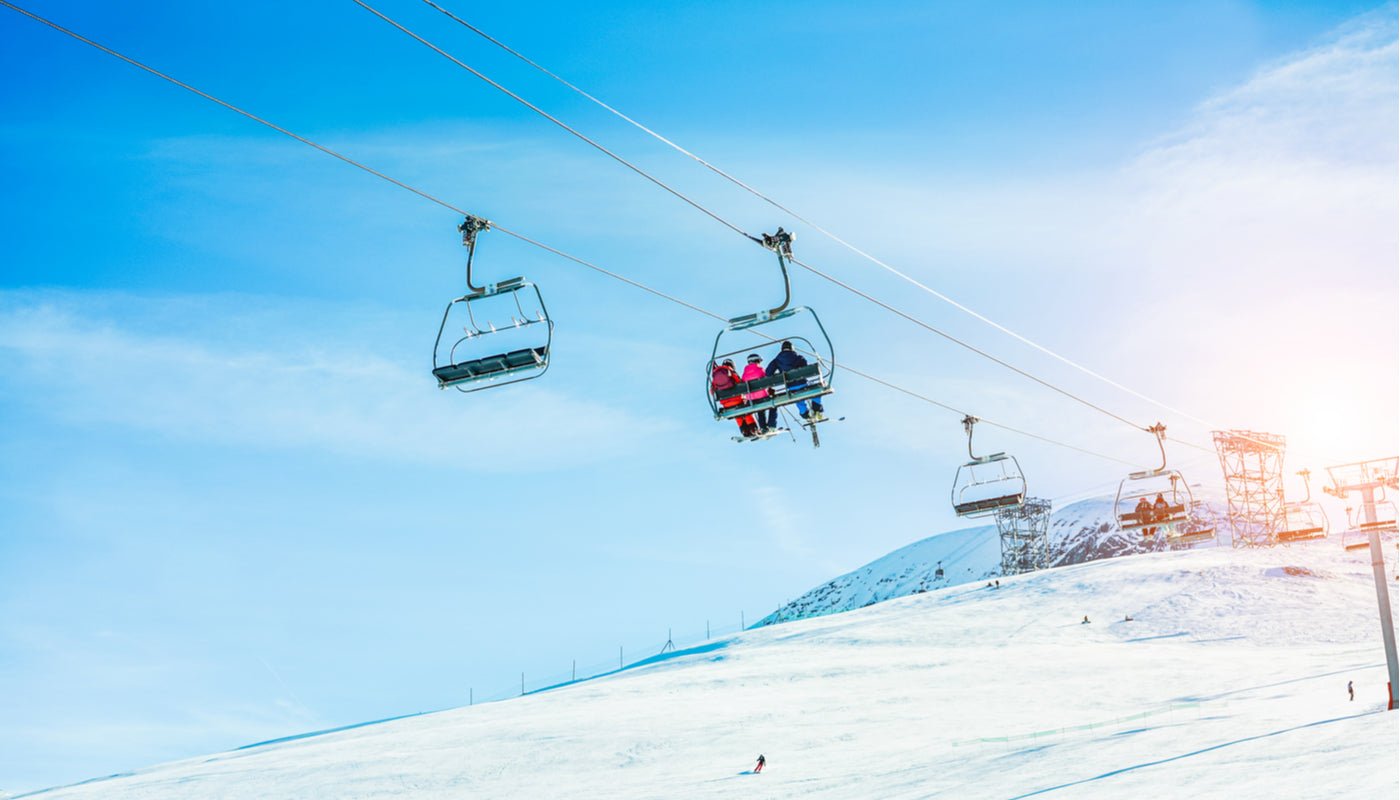 Ski lift heading to top of a ski slope